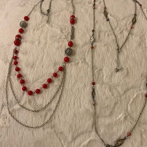 2 long necklaces with some beads.